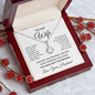 To My Wife anniversary necklace in a mahogany gift box with red winter berries