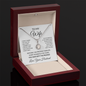 To My Wife necklace in the mahogany luxury gift box against a dark background